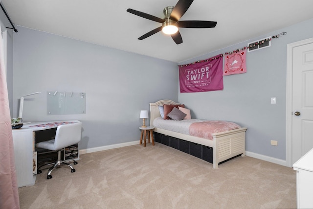 bedroom with carpet, baseboards, and a ceiling fan