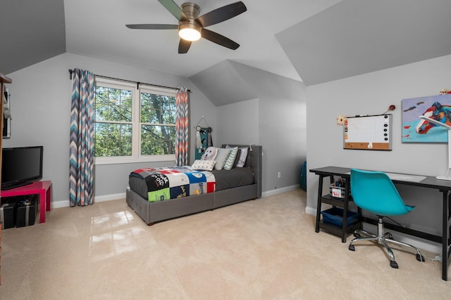 bedroom with carpet, vaulted ceiling, baseboards, and ceiling fan