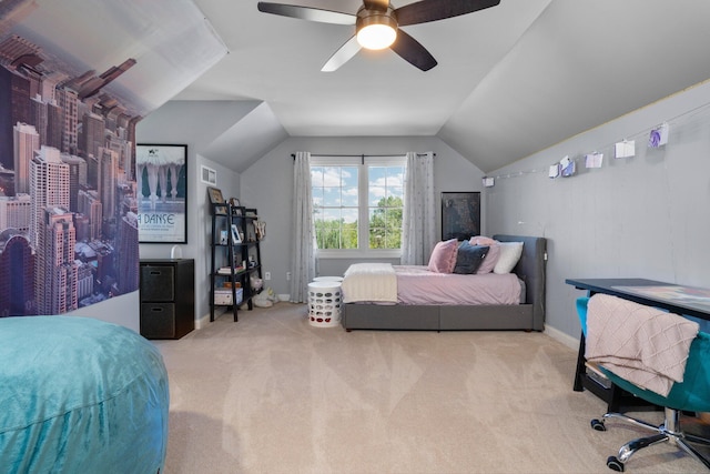 bedroom featuring vaulted ceiling, carpet, a ceiling fan, and baseboards