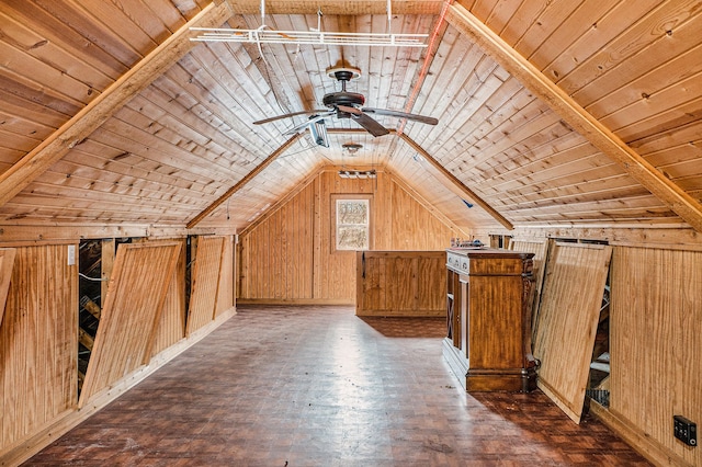 bonus room with wooden ceiling, vaulted ceiling, wooden walls, and ceiling fan