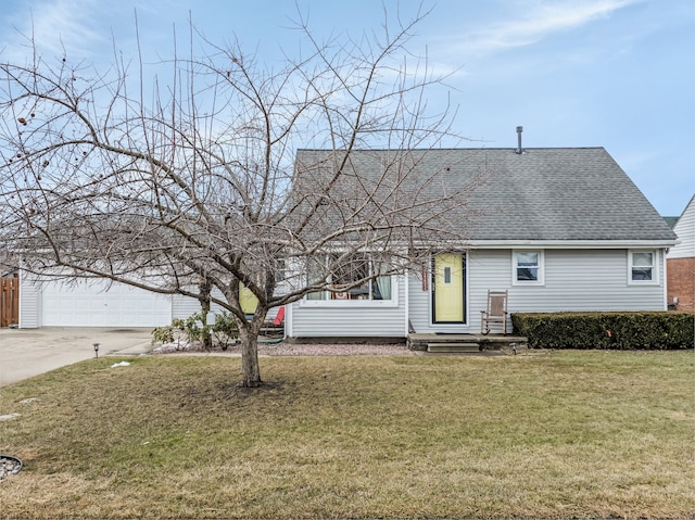 view of front facade with a garage, concrete driveway, roof with shingles, and a front lawn