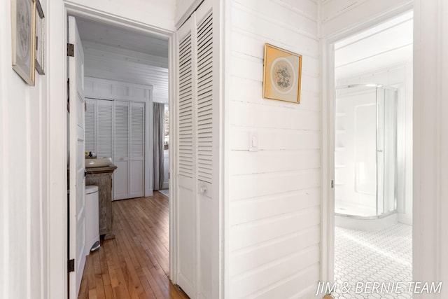 hall featuring light wood-style flooring