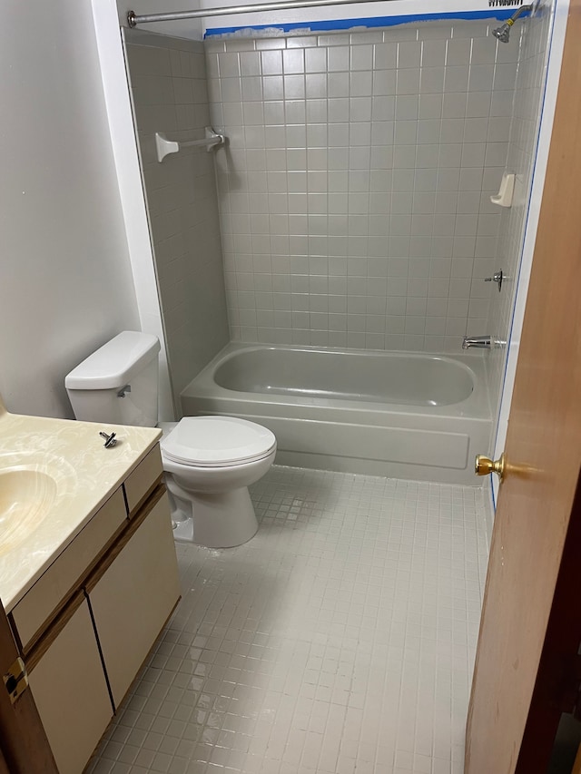 full bathroom with tile patterned flooring, shower / bathing tub combination, vanity, and toilet