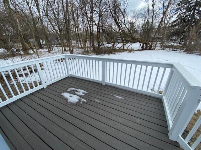 view of snow covered deck