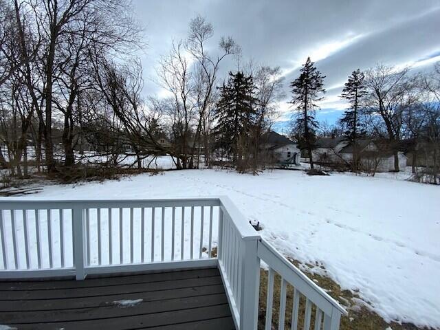 view of snow covered deck