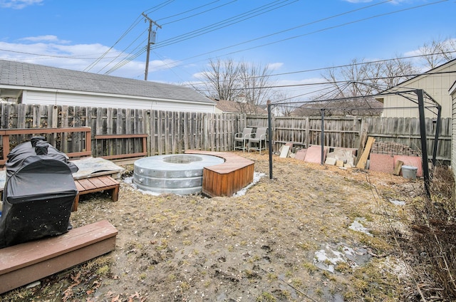 view of yard featuring a fenced backyard