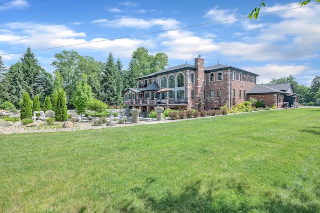 17965 Beck Rd, Northville, MI 48168 - back of property featuring brick siding, a yard, and a chimney