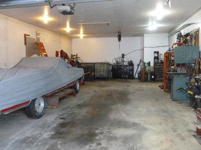 7433 E Maple Ave, Grand Blanc, MI 48439 - garage with a garage door opener
