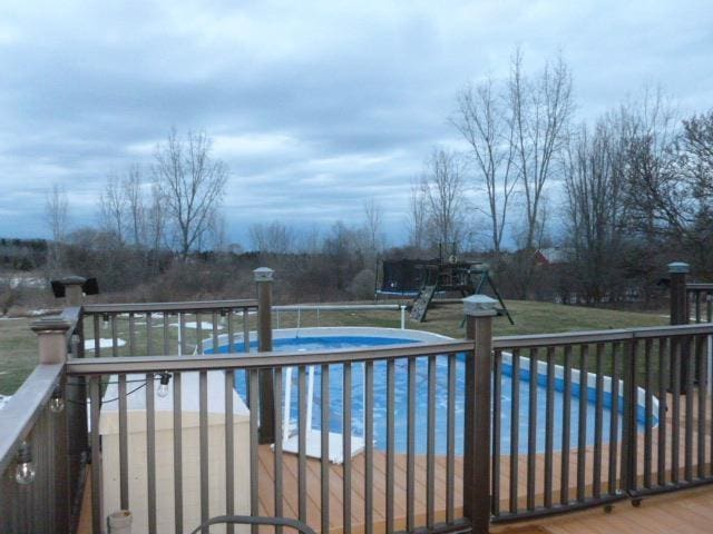 7433 E Maple Ave, Grand Blanc, MI 48439 - outdoor pool featuring a deck