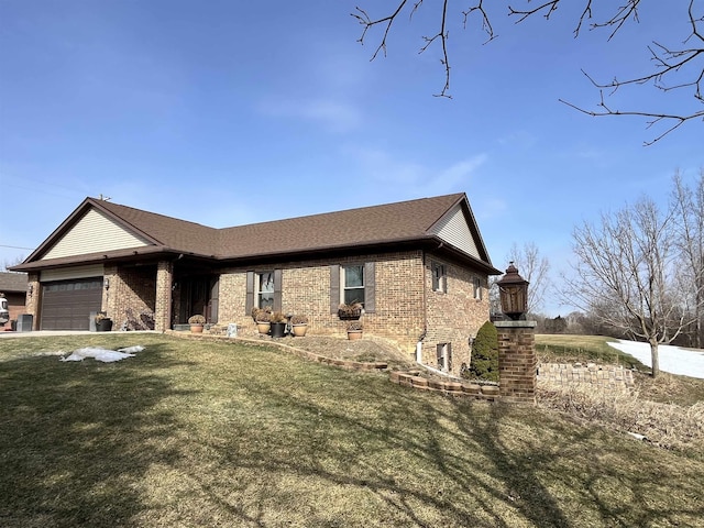 7433 E Maple Ave, Grand Blanc, MI 48439 - ranch-style house with brick siding, a garage, a front yard, and a shingled roof