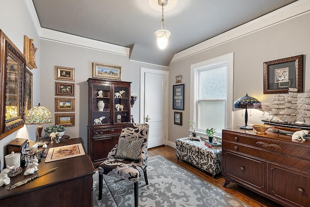 office area with crown molding and wood finished floors