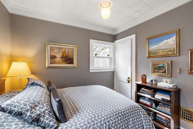 bedroom featuring crown molding