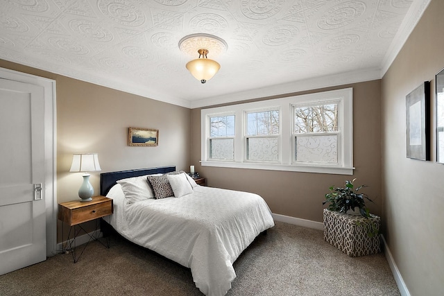 carpeted bedroom with crown molding and baseboards