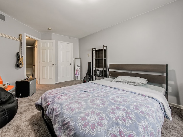 bedroom featuring visible vents, baseboards, and carpet flooring