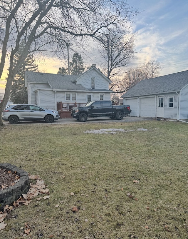 yard at dusk with an outbuilding