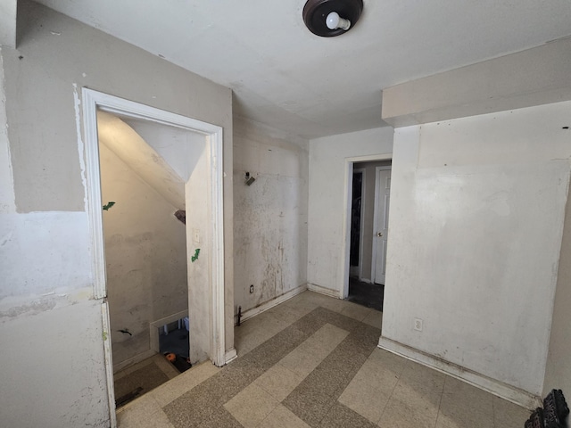 empty room with tile patterned floors