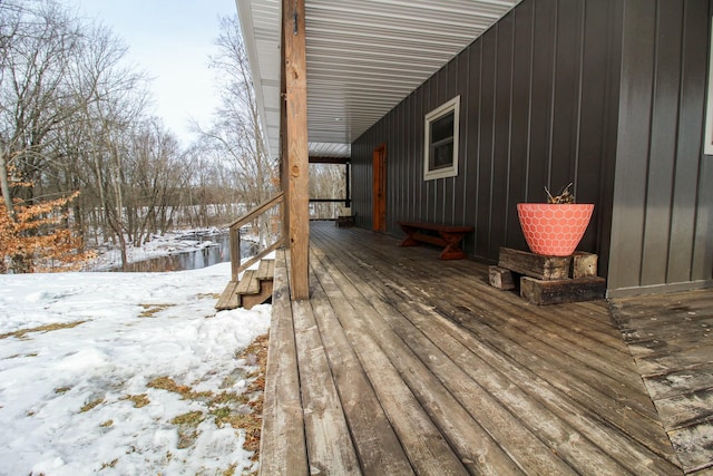 view of snow covered deck