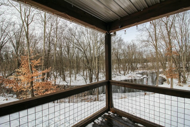 view of snow covered deck