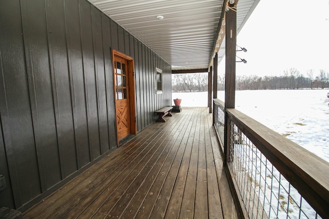 view of snow covered deck