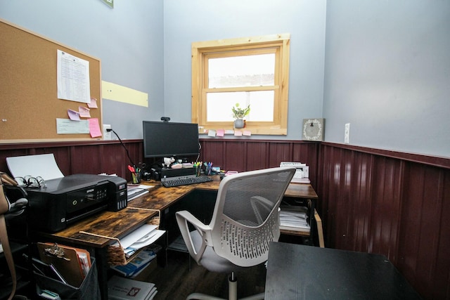 office area with a wainscoted wall