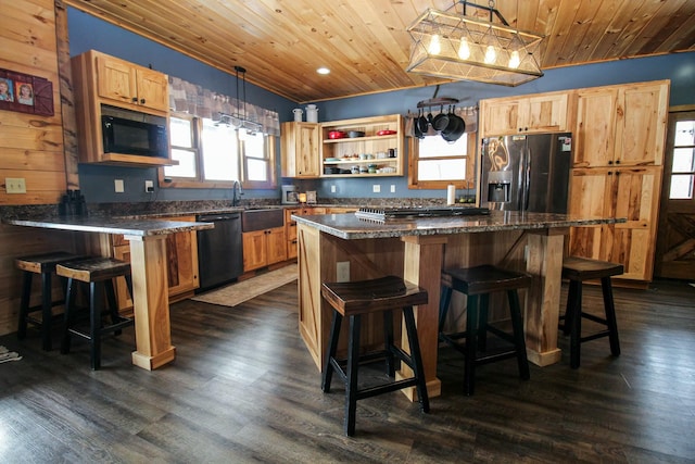 kitchen featuring dark wood-type flooring, a breakfast bar, wood ceiling, and black appliances