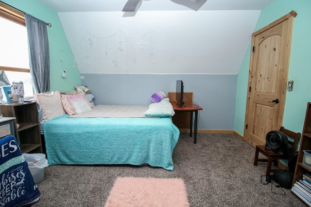 bedroom with lofted ceiling, carpet flooring, ceiling fan, and baseboards