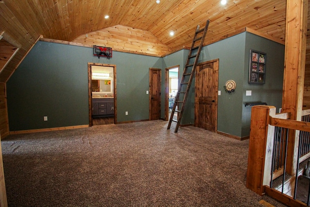 interior space with lofted ceiling, recessed lighting, carpet flooring, wooden ceiling, and baseboards