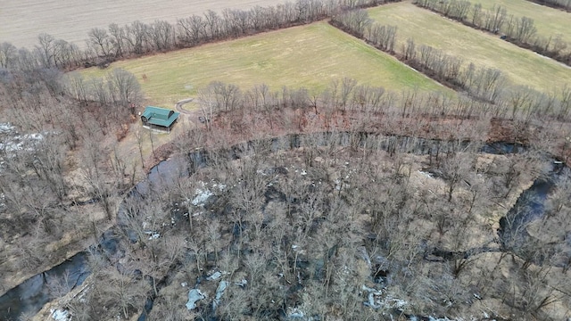 birds eye view of property featuring a rural view