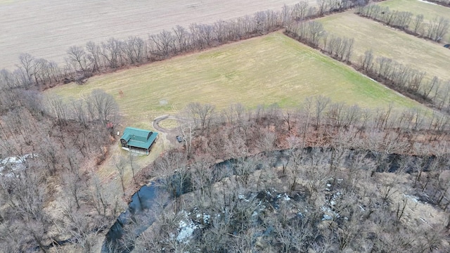 birds eye view of property with a rural view