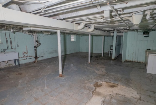 unfinished basement with a sink