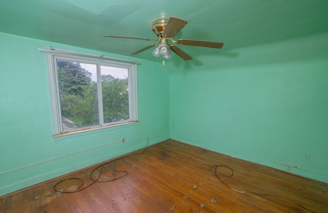 unfurnished room featuring ceiling fan and wood-type flooring