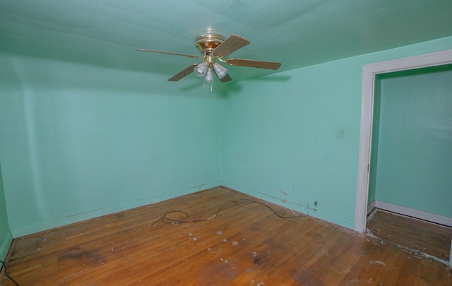 empty room with hardwood / wood-style flooring