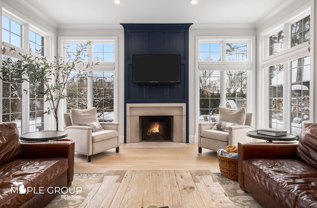 sunroom with a large fireplace