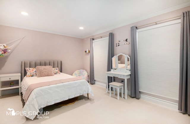 carpeted bedroom featuring baseboards, ornamental molding, and recessed lighting