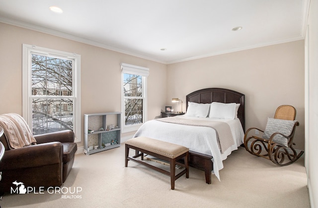 carpeted bedroom featuring ornamental molding and recessed lighting