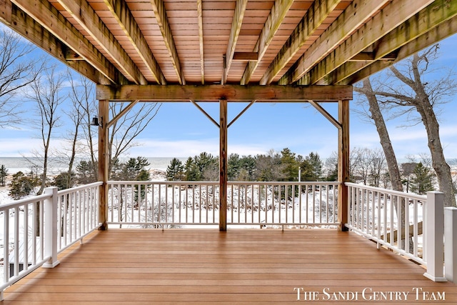 view of snow covered deck