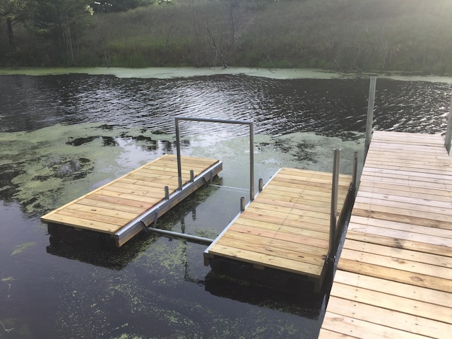 view of dock featuring a water view