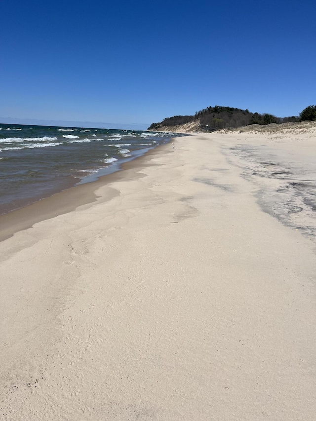 water view featuring a beach view