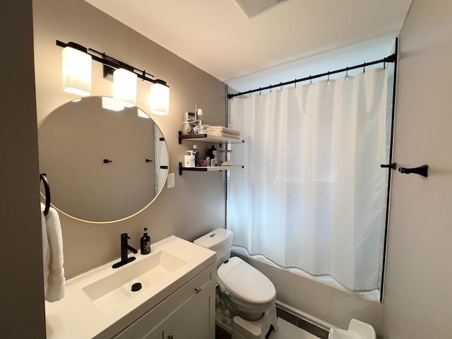 full bath with shower / bath combo, vanity, and toilet