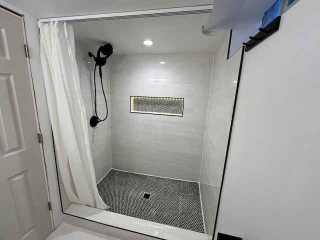 full bath with a shower stall and recessed lighting