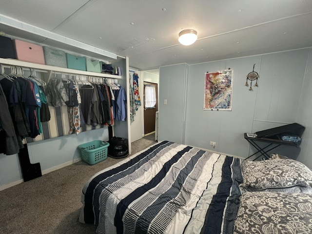 carpeted bedroom featuring a closet