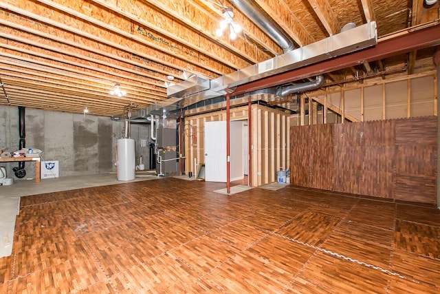 unfinished basement featuring water heater and heating unit