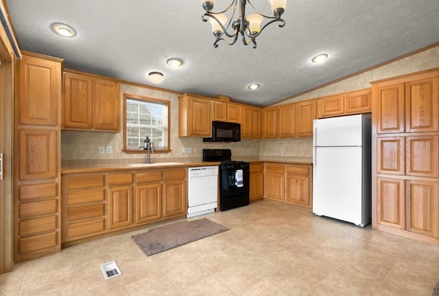 kitchen with lofted ceiling, white appliances, a sink, visible vents, and light countertops