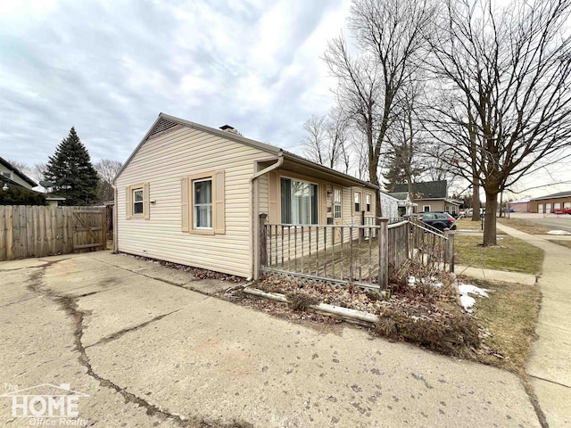 view of side of property with fence