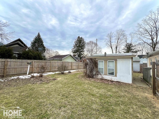 view of yard featuring a fenced backyard