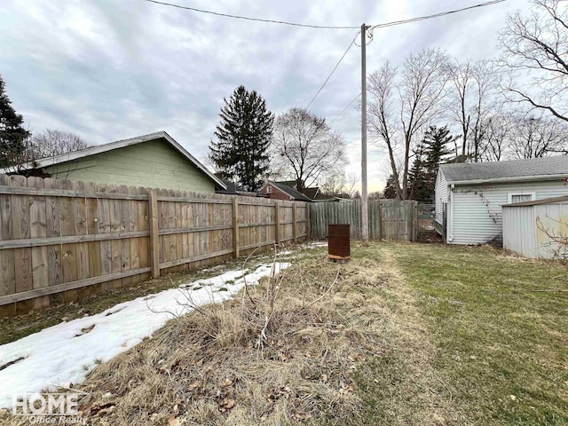 view of yard with a fenced backyard