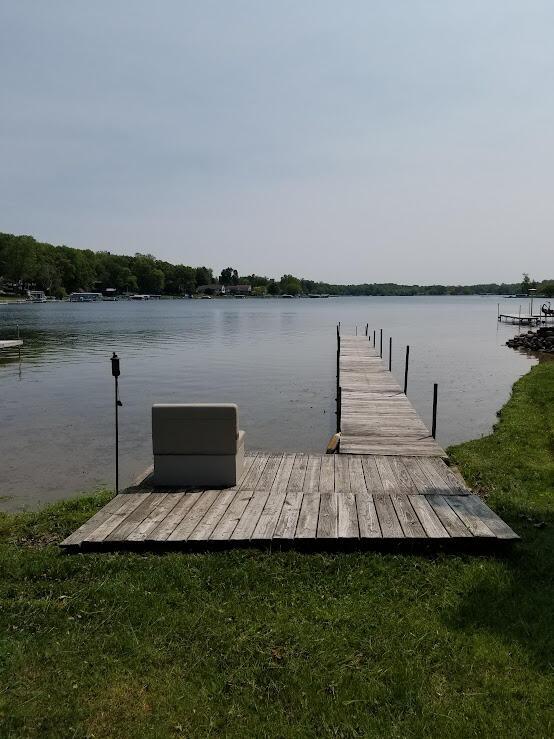 dock area with a water view