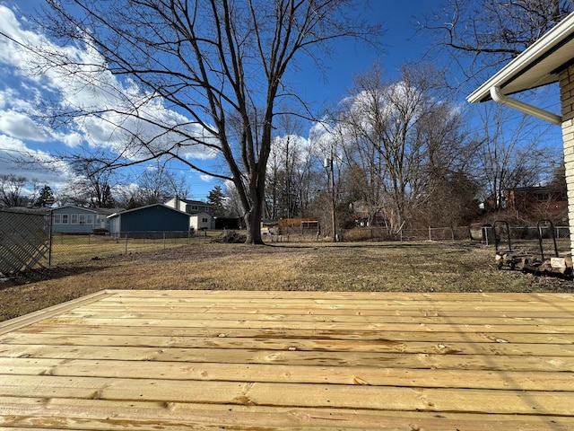 wooden deck featuring fence