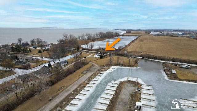 drone / aerial view featuring a water view