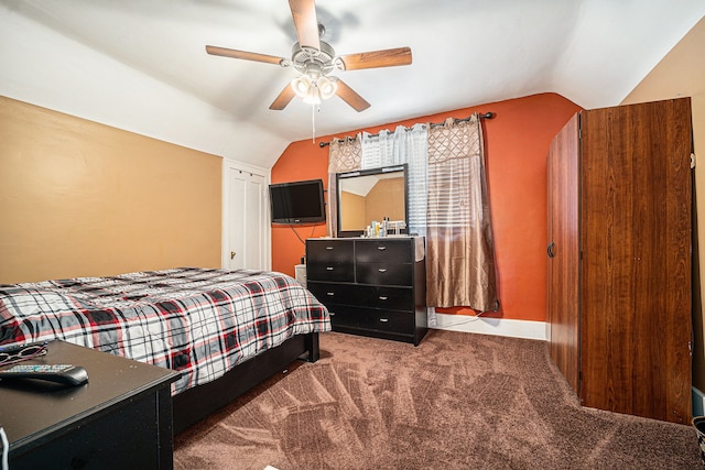 bedroom featuring lofted ceiling, carpet floors, and ceiling fan